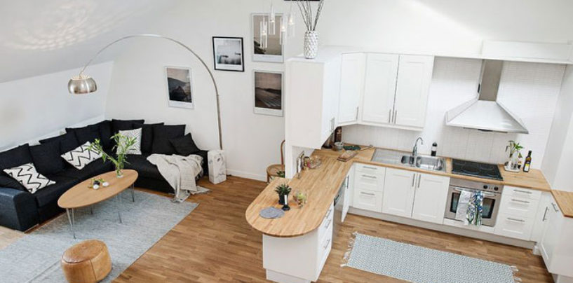 Jak urządzić salon wypoczynkowy z kuchnią? Łączymy pomieszczenia.